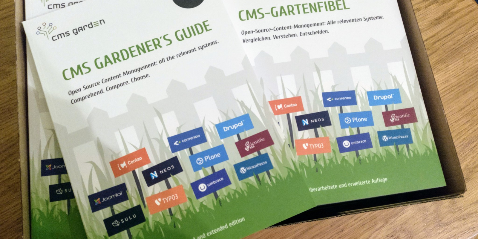 A box with CMS Gardener's Guides. Cover with english titel and - turned around - german title