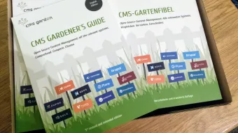 A box with CMS Gardener's Guides. Cover with english titel and - turned around - german title