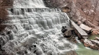 Photo: Waterfall in form of a wide cascade